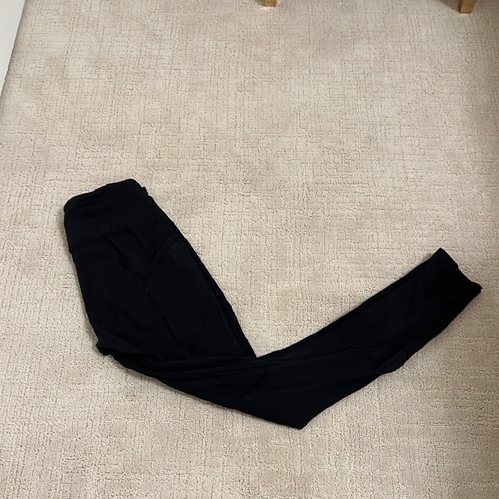 Lululemon black leggings. 28 inch. Size 8. With pockets.